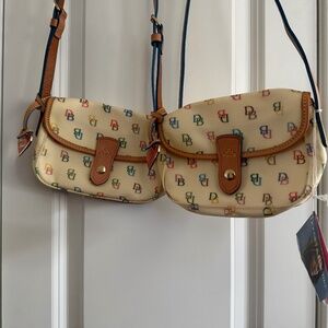 Two NWT Dooney and Bourke mini east west crossbody purses.
